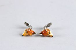A PAIR OF STERLING SILVER AND VITREOUS ENAMEL FOX HEAD CUFFLINKS.