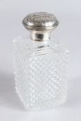 A VICTORIAN SILVER TOP SQUARE GLASS BOTTLE AND COVER. London 1883