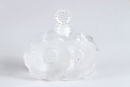A LALIQUE 'TWO FLEURS' FLOWER SCENT BOTTLE. Etched Lalique, France. 9ins high.