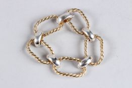 A STERLING SILVER AND SILVER GILT BRACELET.