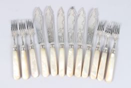 A SET OF SIX MOTHER OF PEARL HANDLED SILVER FISH KNIVES AND FORKS, Sheffield 1919, maker Huttons.