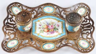 A GOOD SEVRES PORCELAIN AND GILT METAL INK STAND with floral porcelain panels. 11ins high.