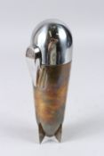 A ZEPPELIN SHAPED COCKTAIL SHAKER, with accessories, 9in high.