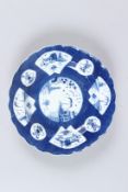 AN 18TH CENTURY BOW BLUE AND WHITE CHINESE PATTERN PLATE, CIRCA 1775. 7.25ins diameter. Chinese