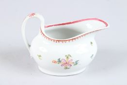 A NEW HALL BOAT JUG painted with flowers. Pattern No. 594.