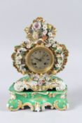 A 19TH CENTURY JACOB PETIT PORCELAIN MANTEL CLOCK, green ground with floral encrusted decoration,