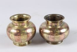TWO 18TH - 19TH CENTURY SOUTH INDIAN TANJOR GANGA JUMNA COPPER AND BRASS LOTA POTS. 3ins high.