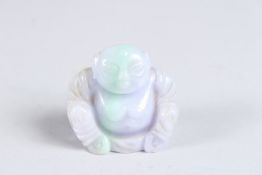 A CHINESE CARVED LILAC JADEITE BABY BUDDHA 1.75ins.