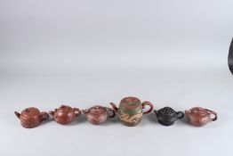 A COLLECTION OF SIX CHINESE YIXING TERRA COTTA TEA POTS