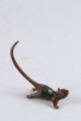 A SMALL BRONZE OKIMONO OF A RAT, 2½in long.