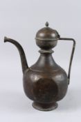A LARGE 17TH - 18TH CENTURY MUGHAL INDIAN BRASS OR BRONZE EWER. 15ins high.