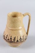 A FINE EARLY ISLAMIC PERSIAN NISHAPUR SAMANID GLAZED POTTERY JUG with Kufic calligraphy. 5.5ins