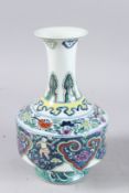 A CHINESE WUCAI VASE, painted to the body with children and flowers, 10in high.