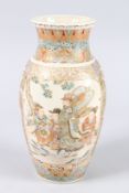 A JAPANESE SATSUMA VASE with panels of figures. 10ins high.