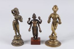 A COLLECTION OF FOUR 18TH - 196TH CENTURY INDIAN BRONZE FIGURES OF HINDU DEITIES.