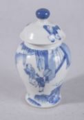 A CHINESE BLUE AND WHITE PORCELAIN JAR AND COVER, painted with figures in a garden, 13cms high.
