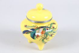 A VERY GOOD SMALL YELLOW ENAMEL VASE AND COVER with floral decoration. 4.5ins high.