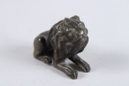 A MEDIEVAL EUROPEAN, possibly German, BRONZE LION. 4ins high.
