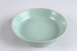 A CHINESE RU WARE CIRCULAR SHALLOW BOWL, 5¾in diameter.