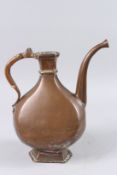 A 17TH CENTURY INDIAN DECCANI COPPER EWER 13ins high.