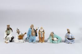 A COLLECTION OF SIX CHINESE POTTERY FIGURES.
