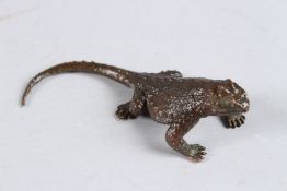 A SMALL BRONZE OKIMONO OF A LIZARD, 4in long.