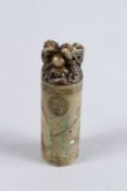 A CHINESE SOAPSTONE SEAL with carved dragon seal. 3ins long.