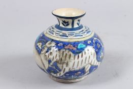 A FINE 19TH CENTURY PERSIAN QAJAR GLAZED POTTERY SQUATTED VASE.