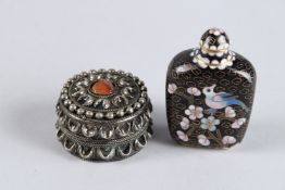 A CLOISONNE ENAMEL SNUFF BOTTLE, 3.5ins high, and a circular silver box, 1.75ins diameter (2).