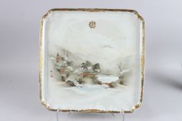 AN EARLY 20TH CENTURY JAPANESE PORCELAIN TRAY, painted with a mountainous river landscape and a gilt