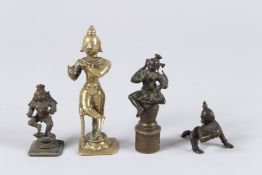A COLLECTION OF FOUR 17TH - 18TH CENTURY SOUTH INDIAN BRONZE FIGURES OF KRISHNA. 4.5ins, 3.75ins,
