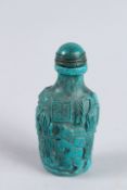 A CHINESE TURQUOISE SNUFF BOTTLE AND STOPPER. 2.75ins high.