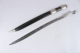AN 18TH - 19TH CENTURY OTTOMAN YATAGHAN SWORD with niello silver handle and engraved blade.