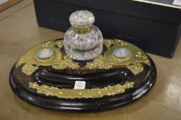 A good Victorian coramandel and brass bound three piece desk set comprising, desk stand with cut