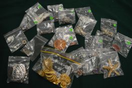 A collection of decorative brooches.