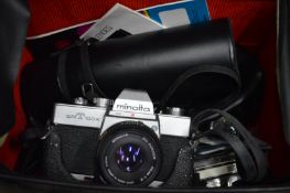 A Minolta camera outfit with case.