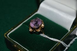 A 9ct gold and amethyst ring.
