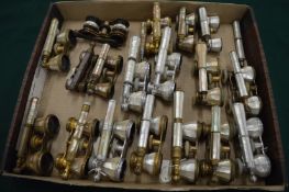 A good collection of mother of pearl opera glasses with folding handles.