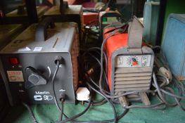 Two small electric welders.