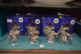 Eight Royal Selangor pewter and glass animal form shot glasses, boxed.