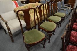 A set of four Georgian style mahogany dining chairs.