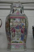 A large Chinese famille rose baluster shaped vase.