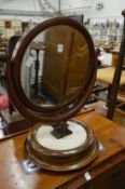 A Victorian mahogany and marble dressing table mirror.