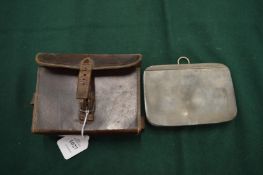 A military sandwich box with original leather case.