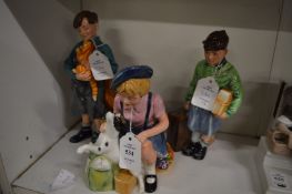 Three Doulton figures, The Homecoming, Welcome Home and The Boy Evacuee.