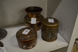 Two Cairo ware boxes and covers and a similar vase.