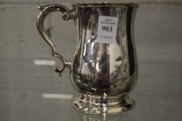 A Georgian silver tankard.