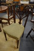 A set of four late Victorian inlaid mahogany occasional chairs.