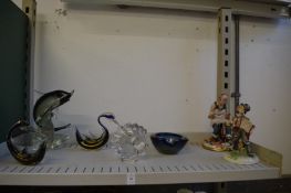 Glass ornaments and two Capodimonte figures.