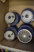 Four modern Hardy fly fishing reels, cased.